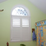 3.5 inch Rear Tilt white Plantation custom interior shutters with an arch Millville DE