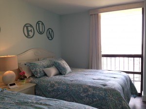 A bedroom with custom blinds from A Shade Above Millville DE