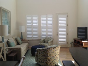 Two windows and a door with custom blinds